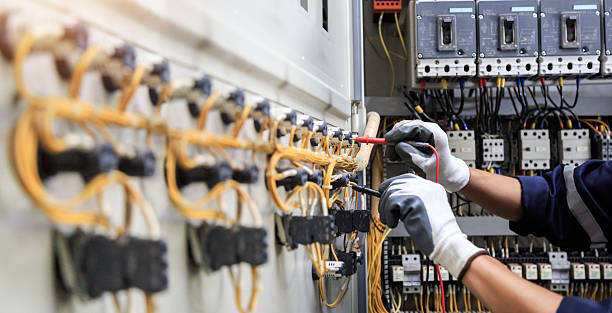 Professional Electrician technician working in Smith Mills, MA